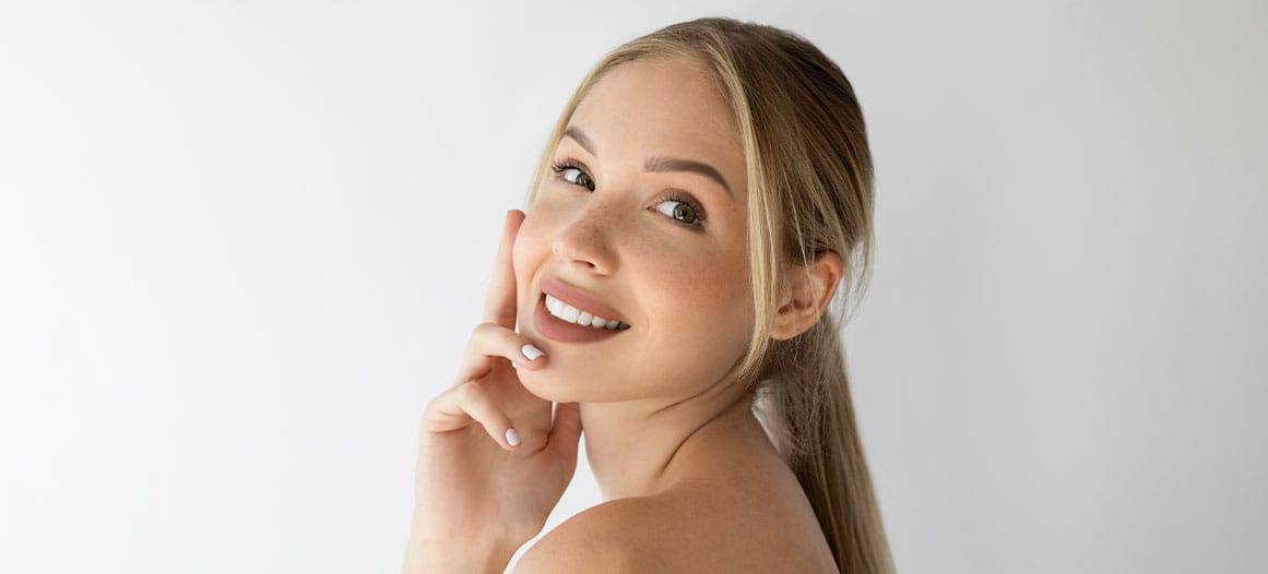 woman after getting facial fat transfer in New Jersey